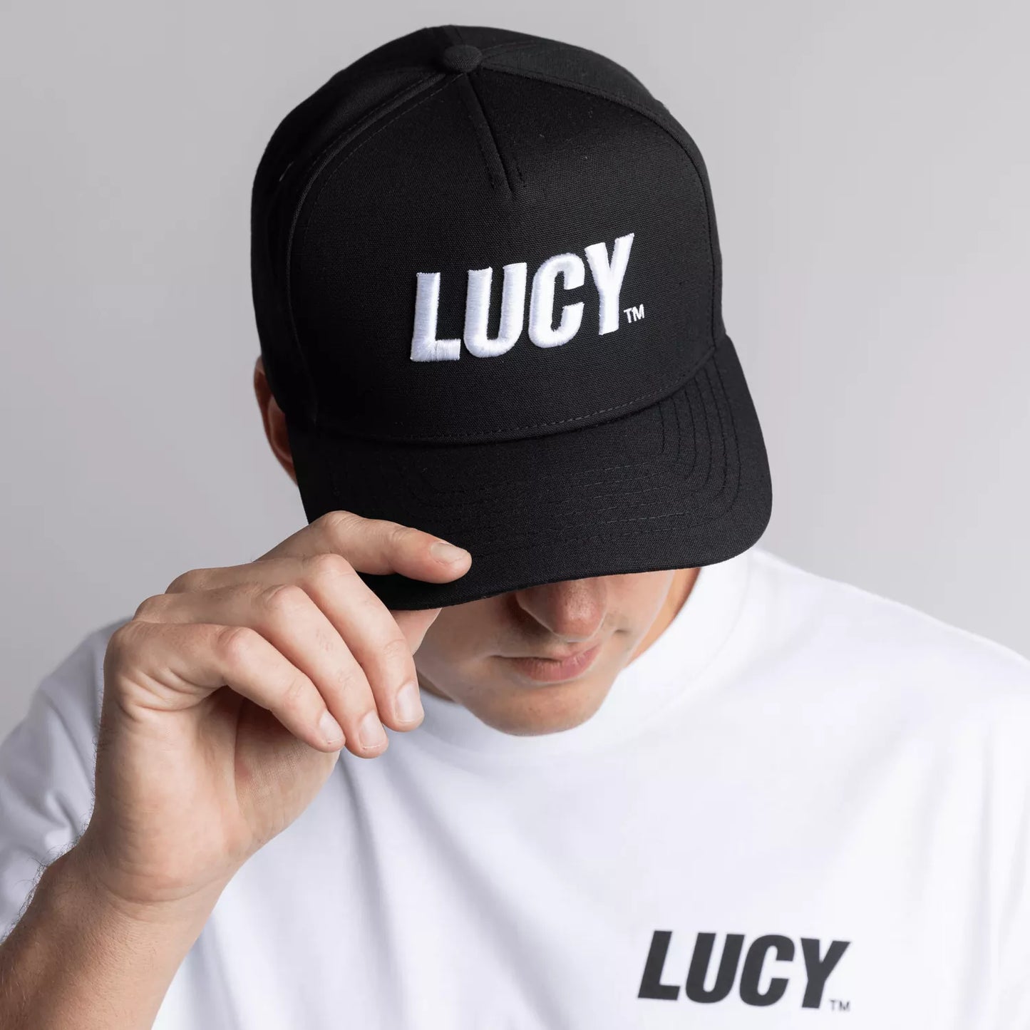 LUCY™ Black Snapback Hat